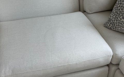 A Water Stain on a white sofa