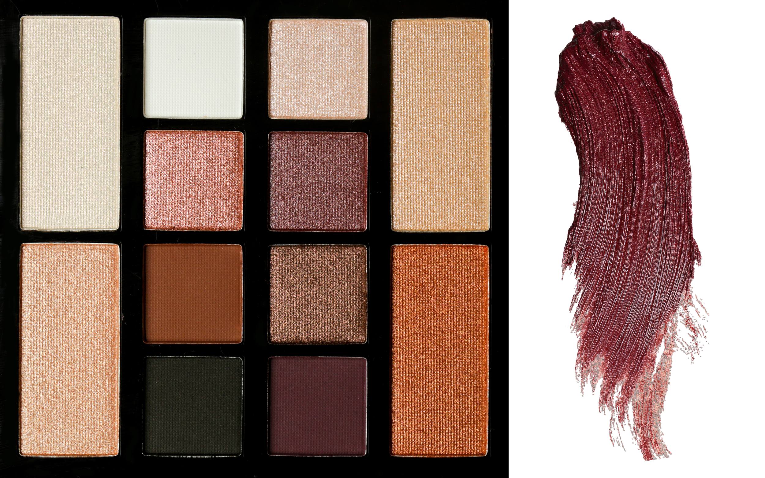Warm-toned eyeshadow palette featuring shimmery golds, coppers, blush pinks, chocolate browns, deep plum, and forest green shades alongside a bold burgundy makeup swatch, showcasing rich beauty color trends inspired by burgundy and earthy neutrals.